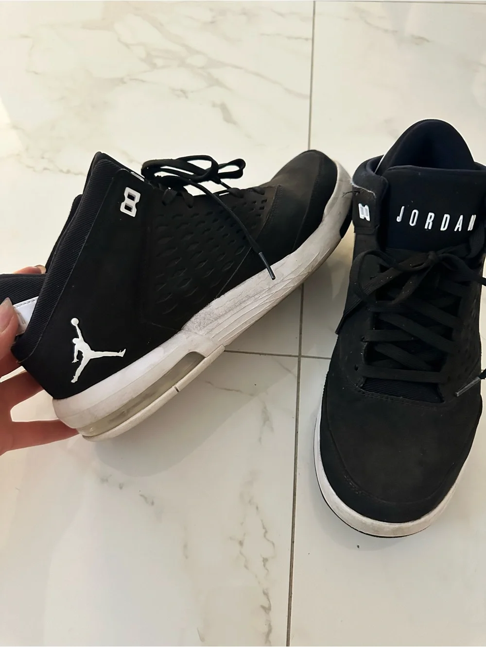 Jordan Black Mid-Top Sneakers with White Sole Accents